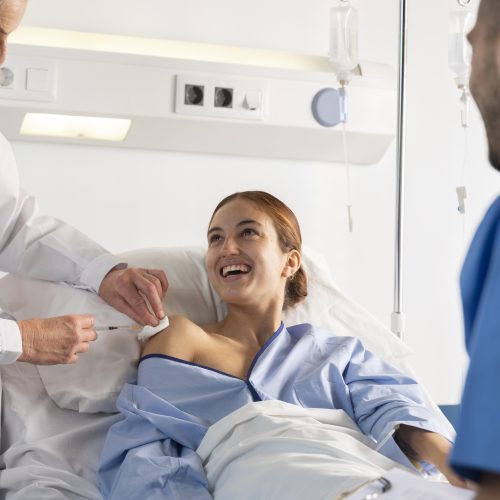 close-up-doctor-nurse-helping-woman